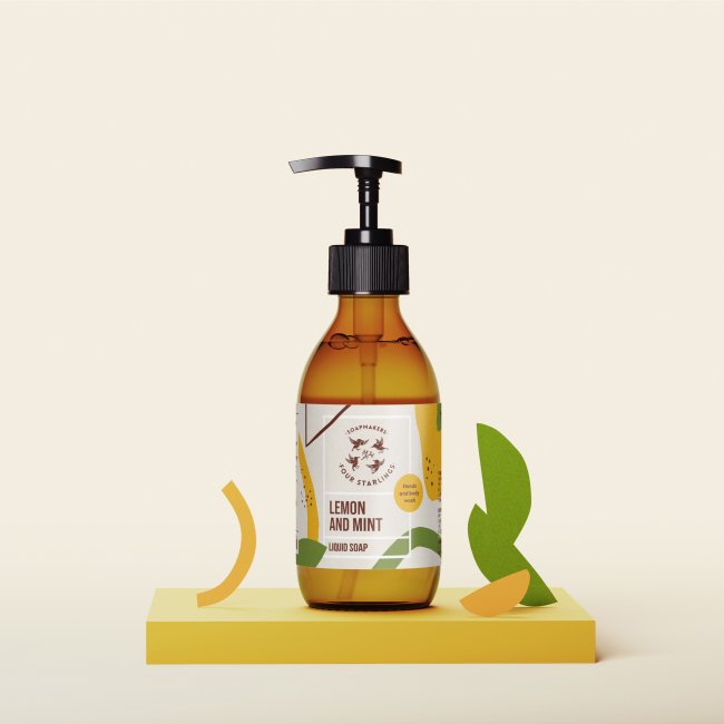 A stylish amber bottle of lemon and mint liquid soap with a pump dispenser, set against a neutral background with abstract decorative elements, perfect for hand and body wash.